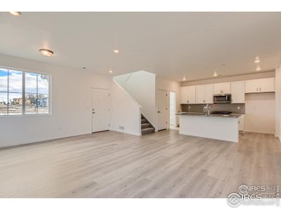 Open floor plan on the main with LVP flooring.