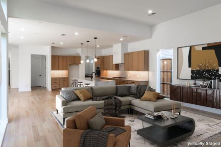 Living room featuring light hardwood / wood-style floors and sink