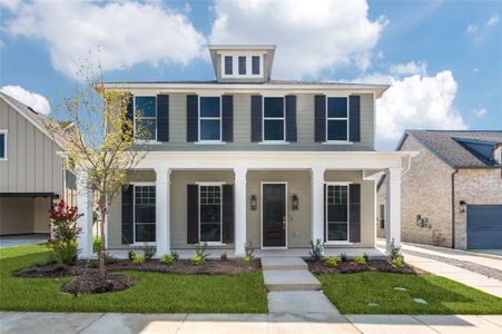 View of front facade with a garage and covered porch