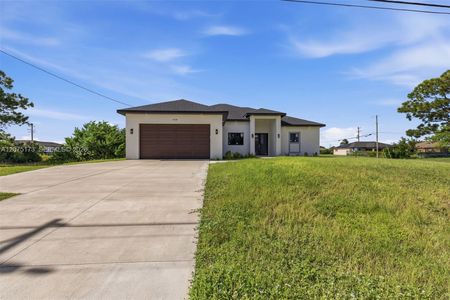 New construction Single-Family house 1728 Kismet Pkwy W, Cape Coral, FL 33993 - image