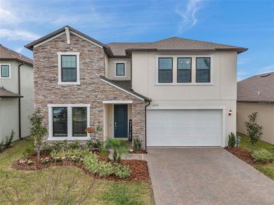 New construction Single-Family house 22294 Storybook Cabin Way, Land O' Lakes, FL 34637 null- photo 1 1