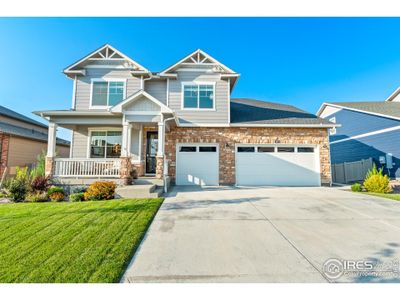 New construction Single-Family house 1687 Rivergate Way, Berthoud, CO 80513 - photo 0