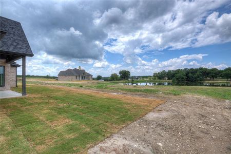 View of yard featuring a water view