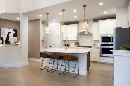 Photo of Pulte model home with same floor plan, not of actual home listed.