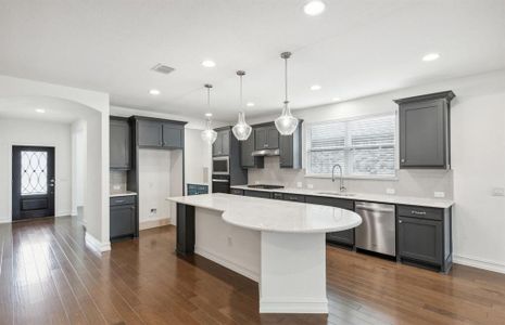 Spacious kitchen with ample cabinet space *real home pictured