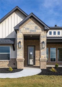 Property entrance with a lawn