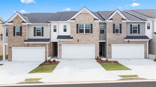 New construction Townhouse house 325 Silver Moon Dr, Loganville, GA 30052 - photo 0