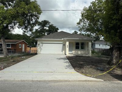 New construction Single-Family house 9408 N Tenth Street, Tampa, FL 33612 - photo 0