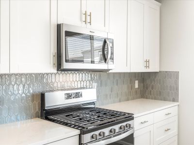 Kitchen in the Wateron floorplan at a Meritage Homes community in Brighton, CO.