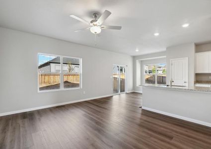 The family room is connected to the kitchen and dining room