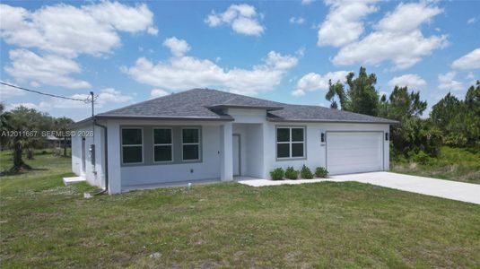 New construction Single-Family house 1909 Moore Ave, Lehigh Acres, FL 33972 - image