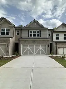 New construction Townhouse house 5623 Chickory Dr, Unit 125, Flowery Branch, GA 30542 Kingsbridge- photo 0