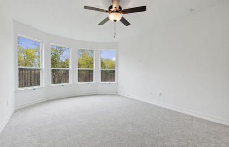 Elegant owner's suite with Bay window *real home pictured