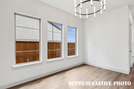 Whether it's grand dinner parties or cozy family meals, this light filled dining room is the perfect place for you to entertain.  REPRESENTATIVE PHOTO