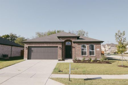 View of front of property featuring a front yard, a garage, and central AC unit