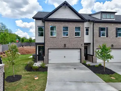 New construction Townhouse house 5700 Urban Village Wy, Unit 1, Tucker, GA 30084 Evergreen- photo 0