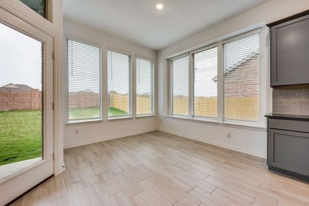 Unfurnished sunroom with a healthy amount of sunlight