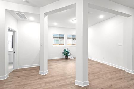 Another view of this open Study with high ceilings and finyl plank floors!