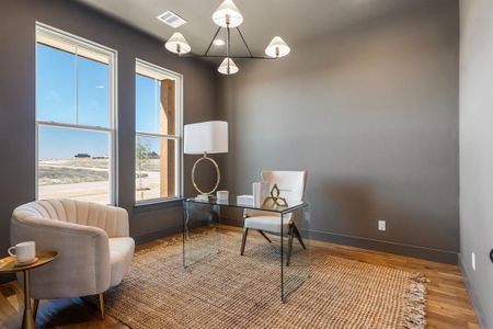 Sitting room featuring hardwood / wood-style flooring