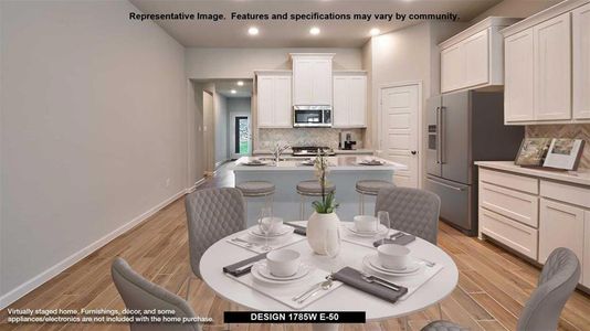 Dining room with sink and light hardwood / wood-style floors