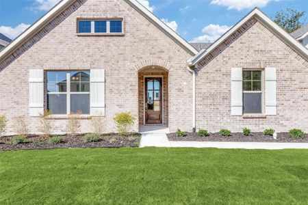 View of front of house featuring a front yard