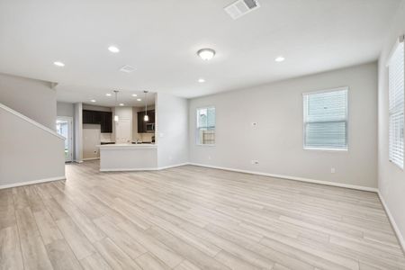 Living area w/ vinyl plank flooring