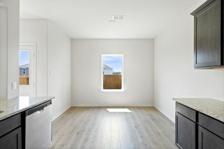 Dining area featuring light wood-style flooring