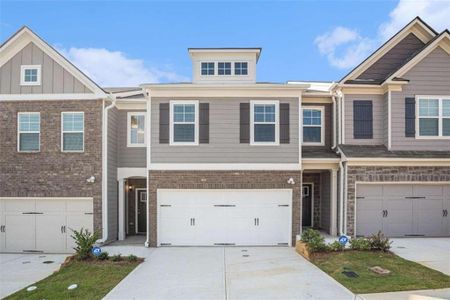 New construction Townhouse house 7685 Feast Road, Fairburn, GA 30213 - photo 0