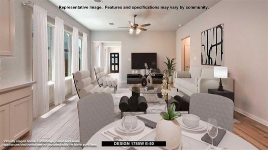 Living room with light hardwood / wood-style flooring and ceiling fan