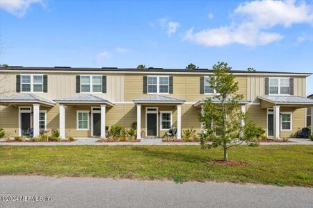 New construction Townhouse house 86472 Shortline Circle, Yulee, FL 32097 - photo 0