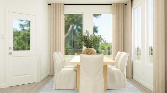 Dining space featuring light hardwood / wood-style floors