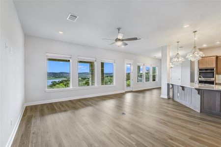 Gorgeous windows let the natural light into the family room, dining room and kitchen.