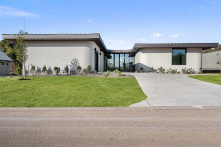 View of front of property featuring a front lawn