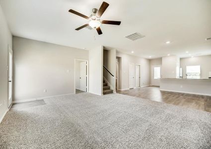 The family offers great natural light, an open layout and a ceiling fan.