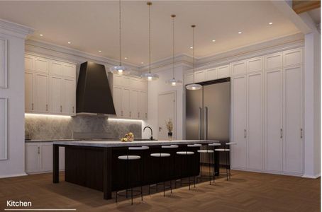 Kitchen featuring wall chimney range hood, parquet floors, a spacious island, pendant lighting, and built in refrigerator