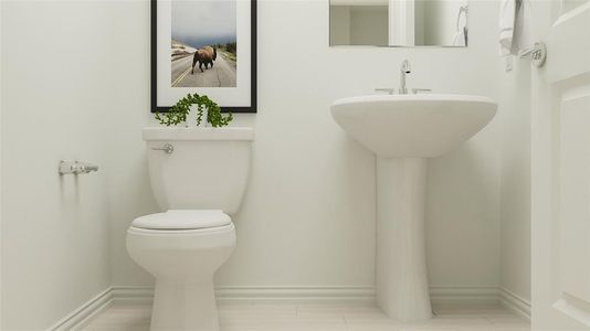 Bathroom featuring tile patterned flooring and toilet