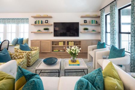 Living area with vaulted ceiling and wood finished floors