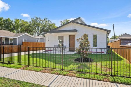 Front View of Home  Featuring a Little Gem Magnolia Tree.