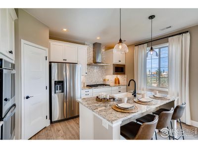 PHOTOS OF MODEL - HOME DEOS HAVE GOURMET KITCHEN AS SHOWN!