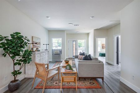 Living room featuring hardwood / wood-style flooring