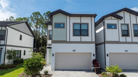 New construction Townhouse house 10358 Ebb Tide Lane, Orlando, FL 32821 - photo 0