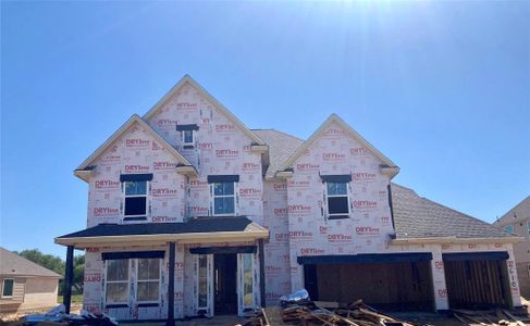 Two-story home with 5 bedrooms, 3.5 baths and 3 car attached garage