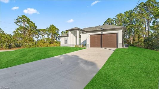 New construction Single-Family house 505 Wabasso Ave S, Lehigh Acres, FL 33974 - image