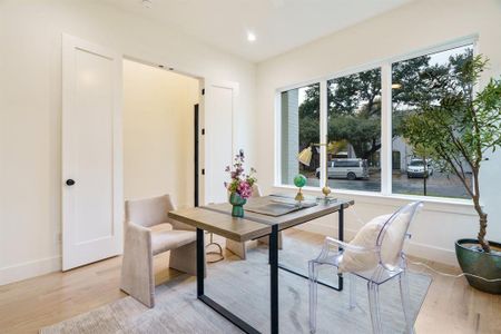 Office space with light wood-type flooring