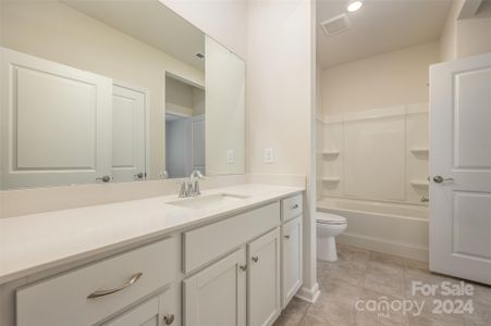 Nice full bath off secondary bedroom.  Private area for live- in relative or caregiver or children.