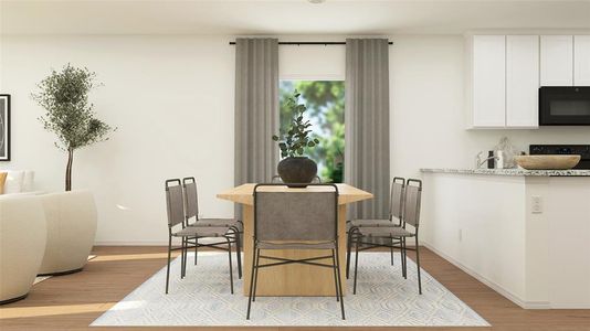 Dining space featuring light hardwood / wood-style flooring