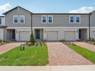 New construction Townhouse house 16390 Bird Of Paradise Ave, Clermont, FL 34714 Calistoga I- photo 0