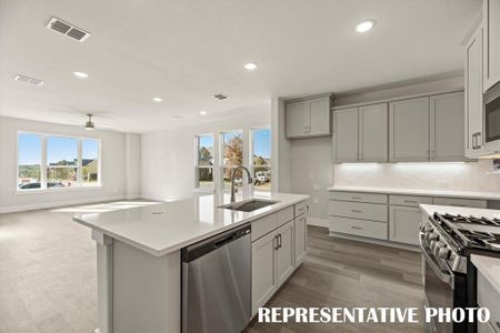 The chef will love being the center of attention in this gorgeous kitchen!  REPRESENTATIVE PHOTO