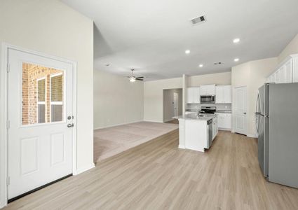 The Kendall has an incredible open layout with the kitchen open to the dining room and family room.