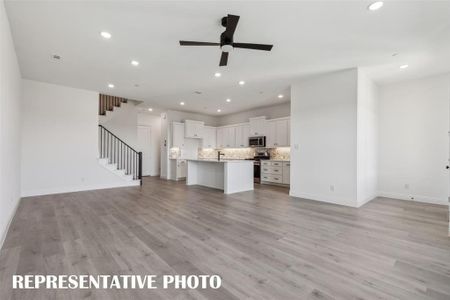 Our Helaina plan offers an inviting, open floor plan perfect for entertaining family and friends.  REPRESENTATIVE PHOTO